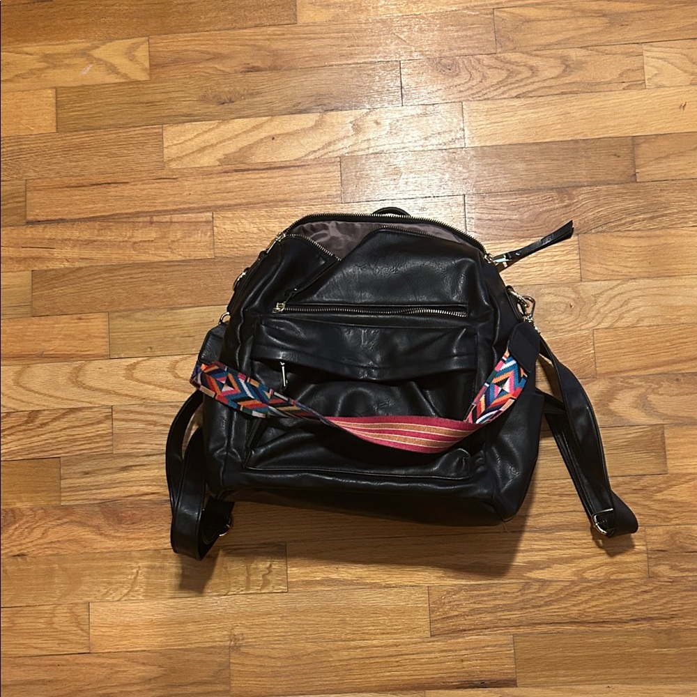 Stylish Black Leather Men's Bag with Colorful Strap